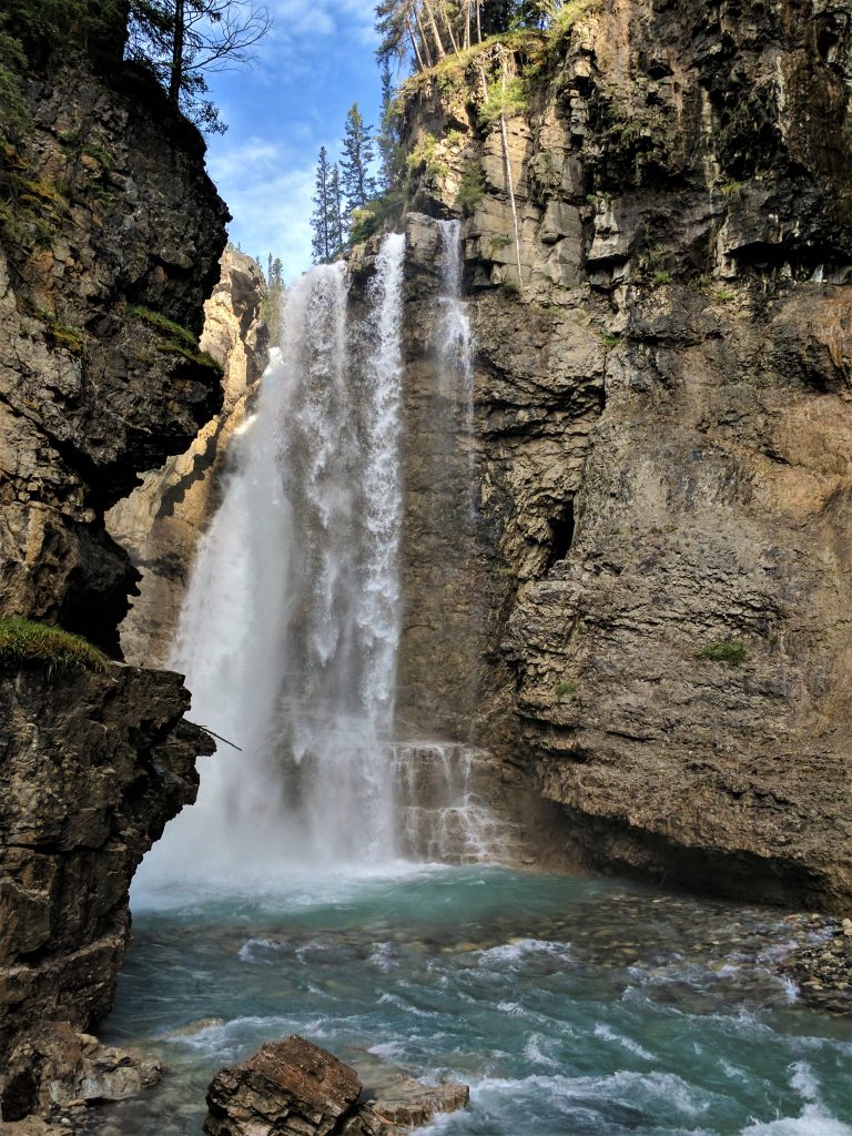 A partially-obscured waterfall at Johnston Canyon