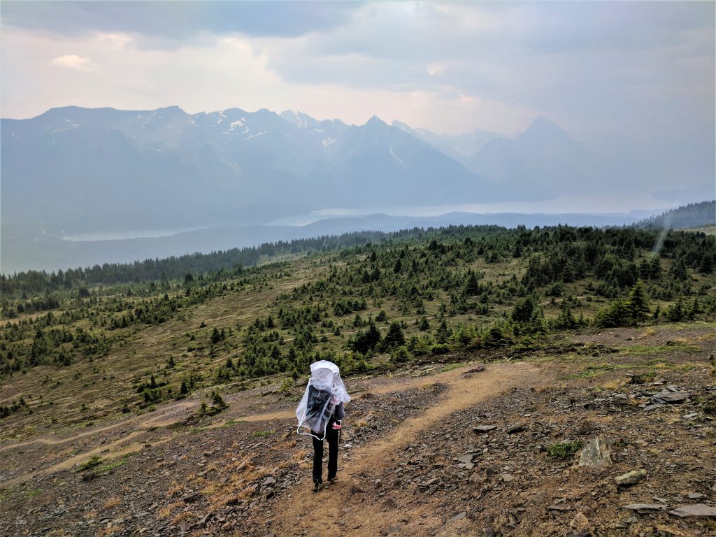 A hiker walking along the path to Bald Hills on a smoky day