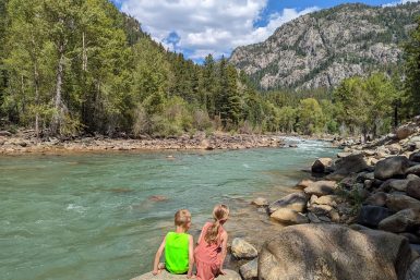 Sitting on the edge of the Animas River in Colorado