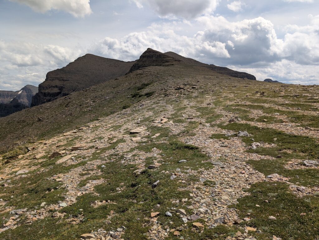 A gradual incline leading up to a mountain peak in the Two Medicine Area