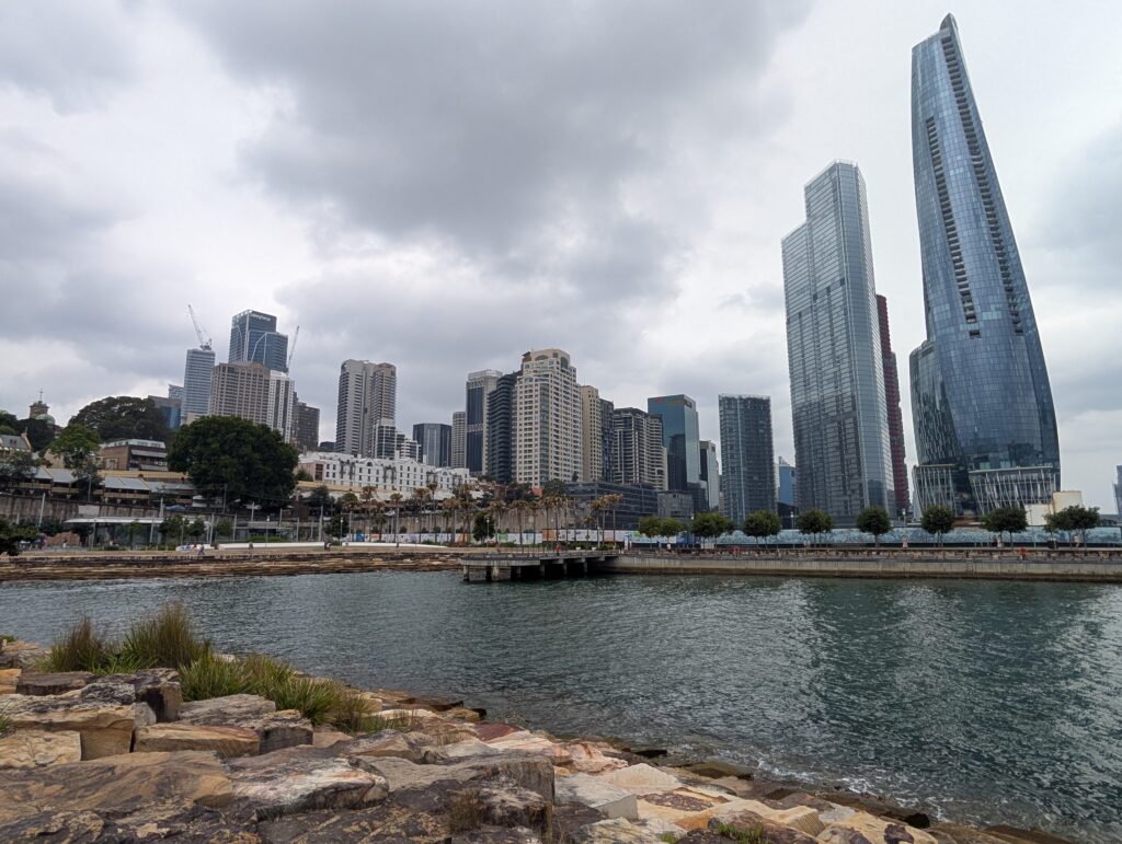 Tall buildings across an inlet of water in Sydney, Australia