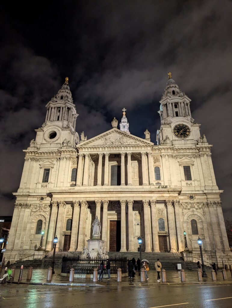 The front of St. Paul's Cathedral in London at night