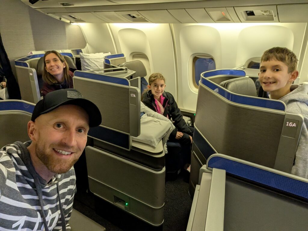 A family of four in first class on an airplane
