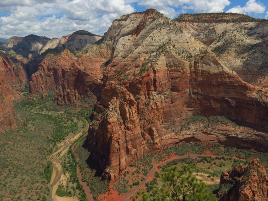 A river winding around a mountainous red and white landscape
